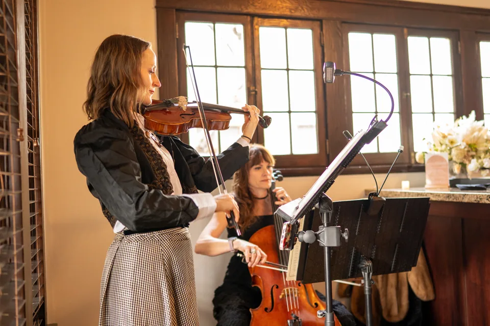 Violin and cello performance at Intersecting Nights
