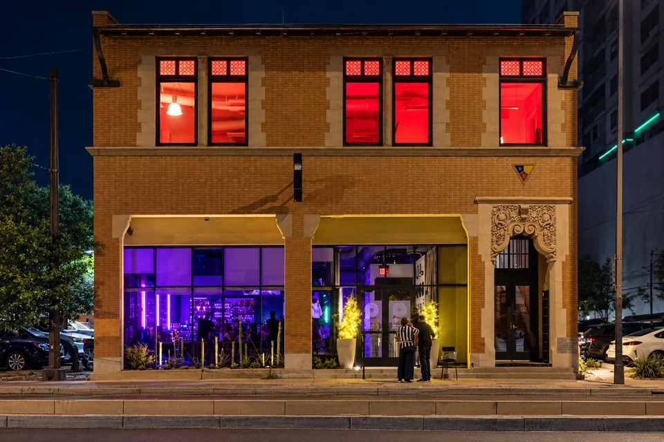 Historic Hardware Store facade at night
